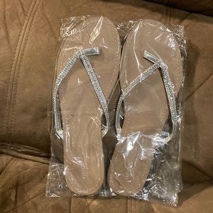 2 different pairs size 8 and size 11: crystal flip flops